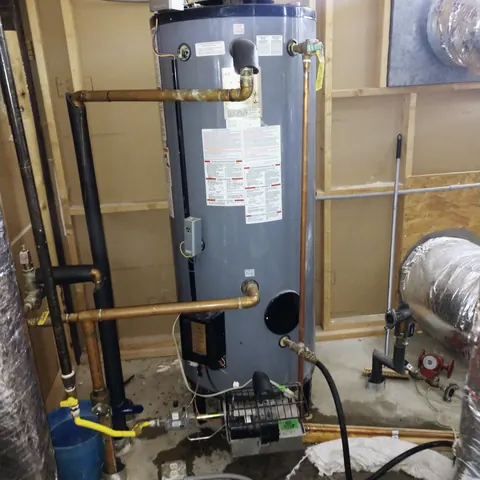 Gas water heater install, from Eschberger Plumbing Company LLC’s own photographs.