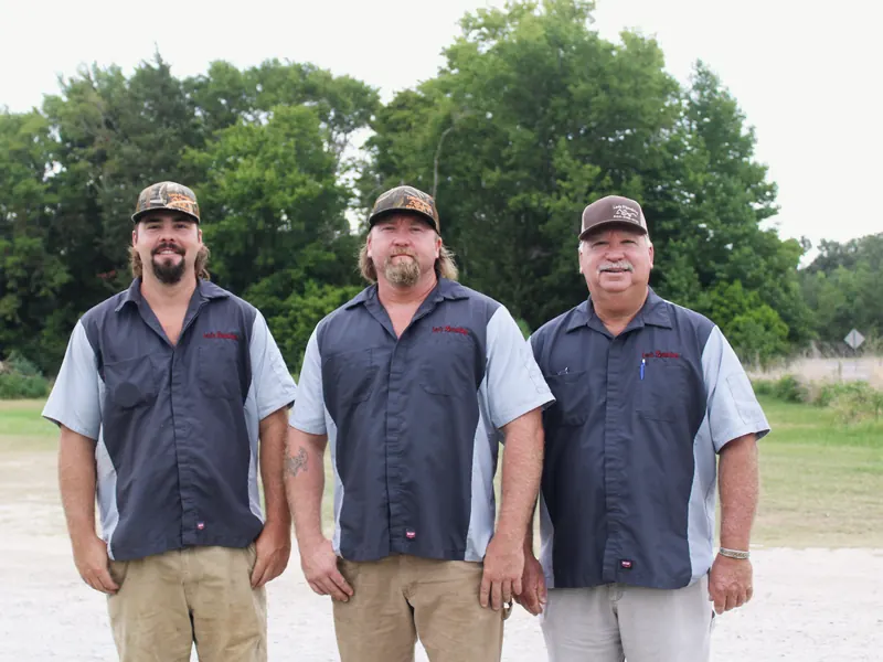 Three-man crew in Lee's Plumbing uniforms, from Lee's Plumbing’s own website.